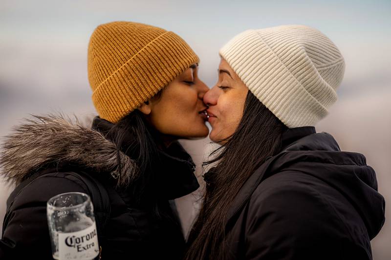Pinky and Shika sharing a kiss on a winter day in Whistler
