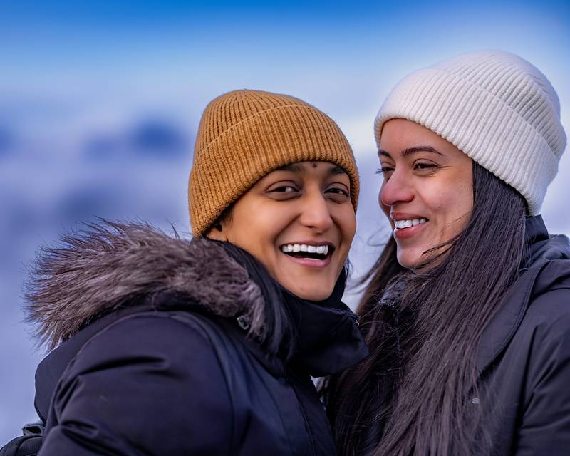 Pinky and Shika laughing together in the snow at Whistler